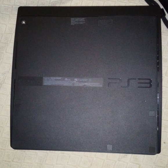 PS3 SLIM 360MB: BARELY USED, 2 controllers, wand, camera, 12 games. - Picture 2 of 4